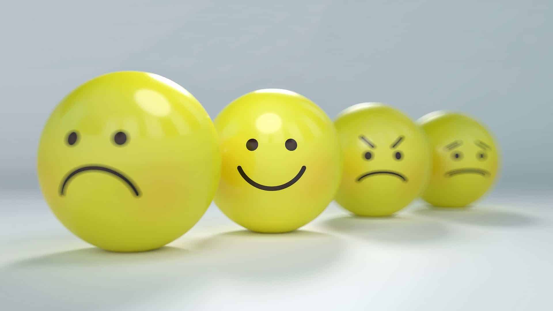 Yellow smiley, frowy and mad faces 