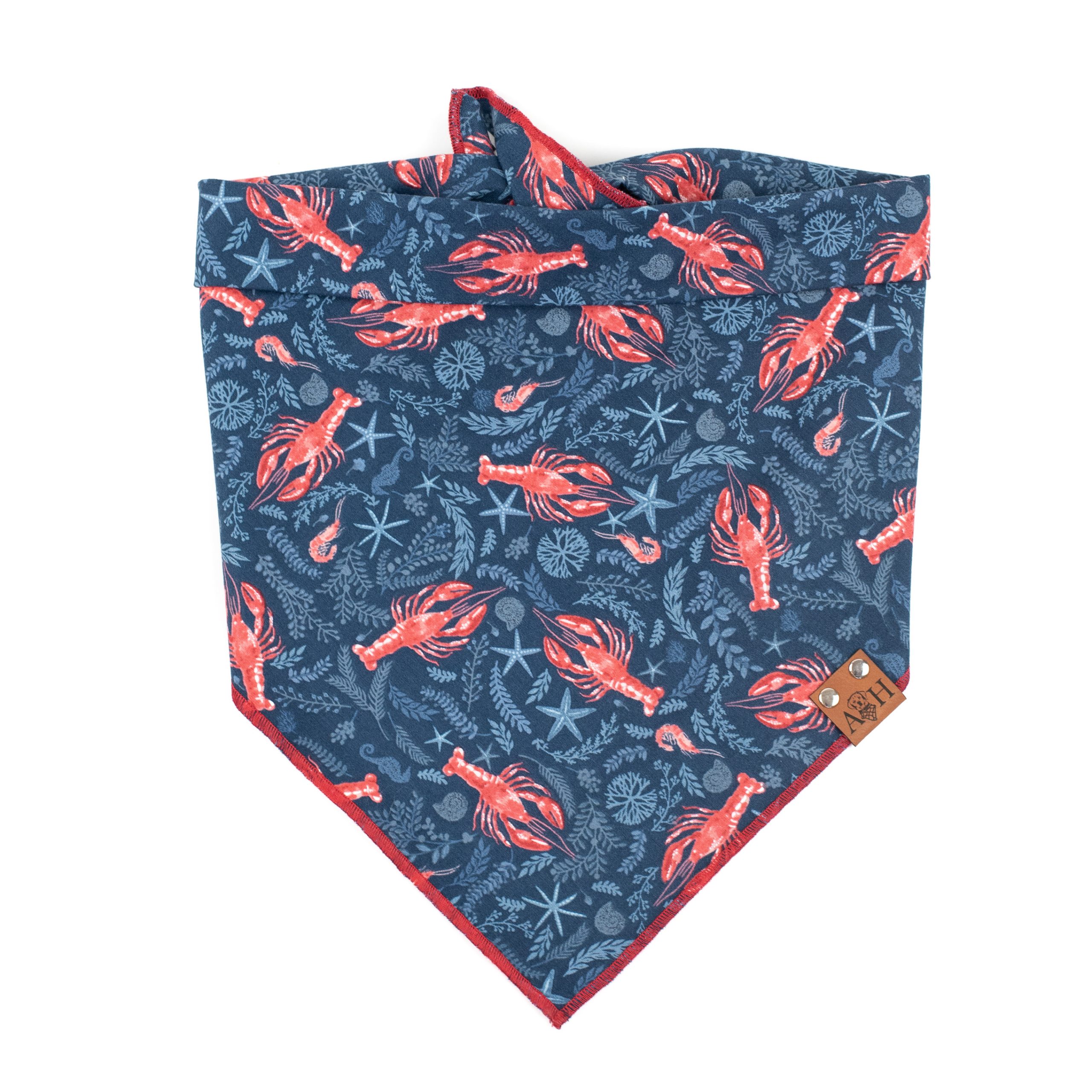 Lobster dog bandana with navy background, red lobsters and other ocean themes