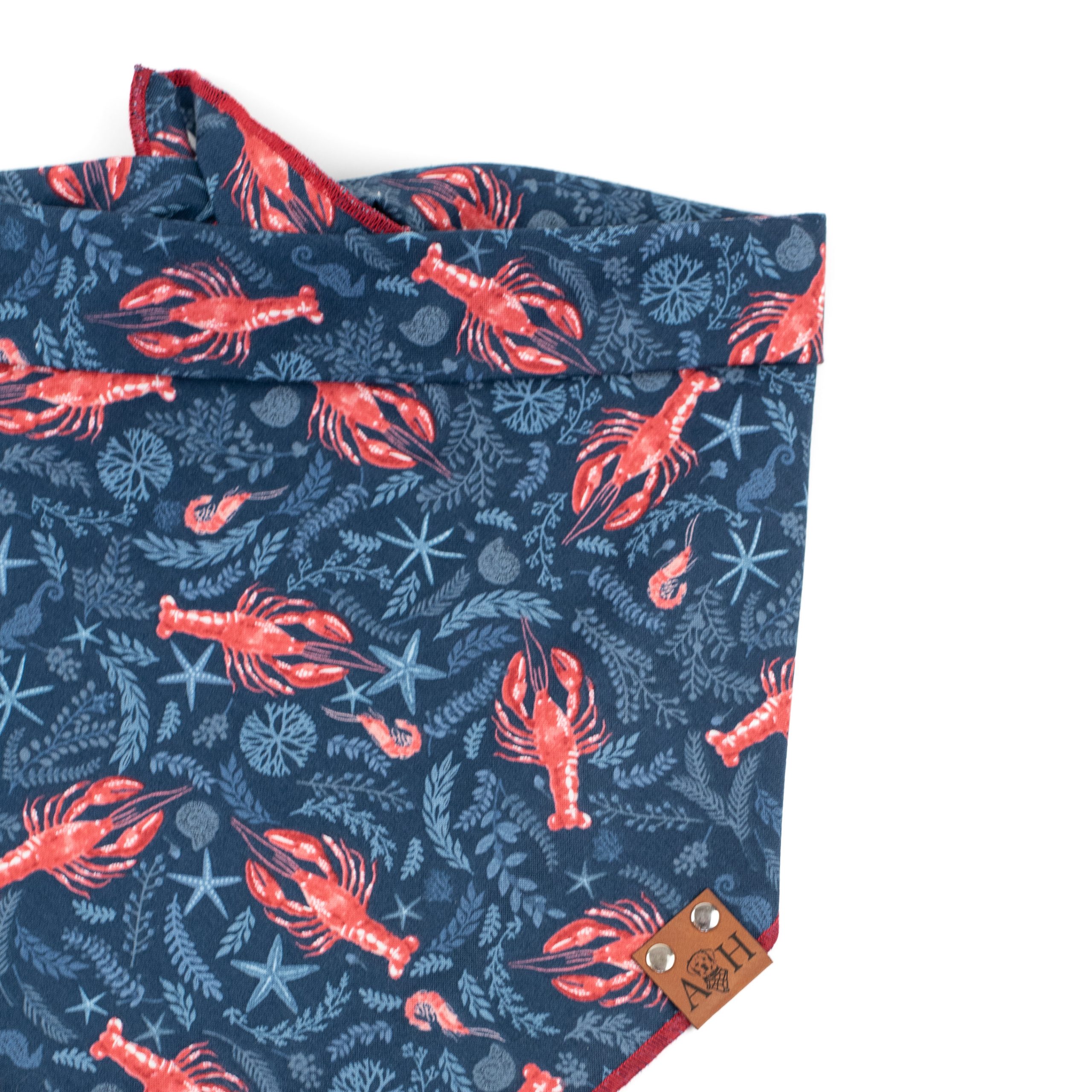 Lobster dog bandana with navy background, red lobsters and other ocean themes