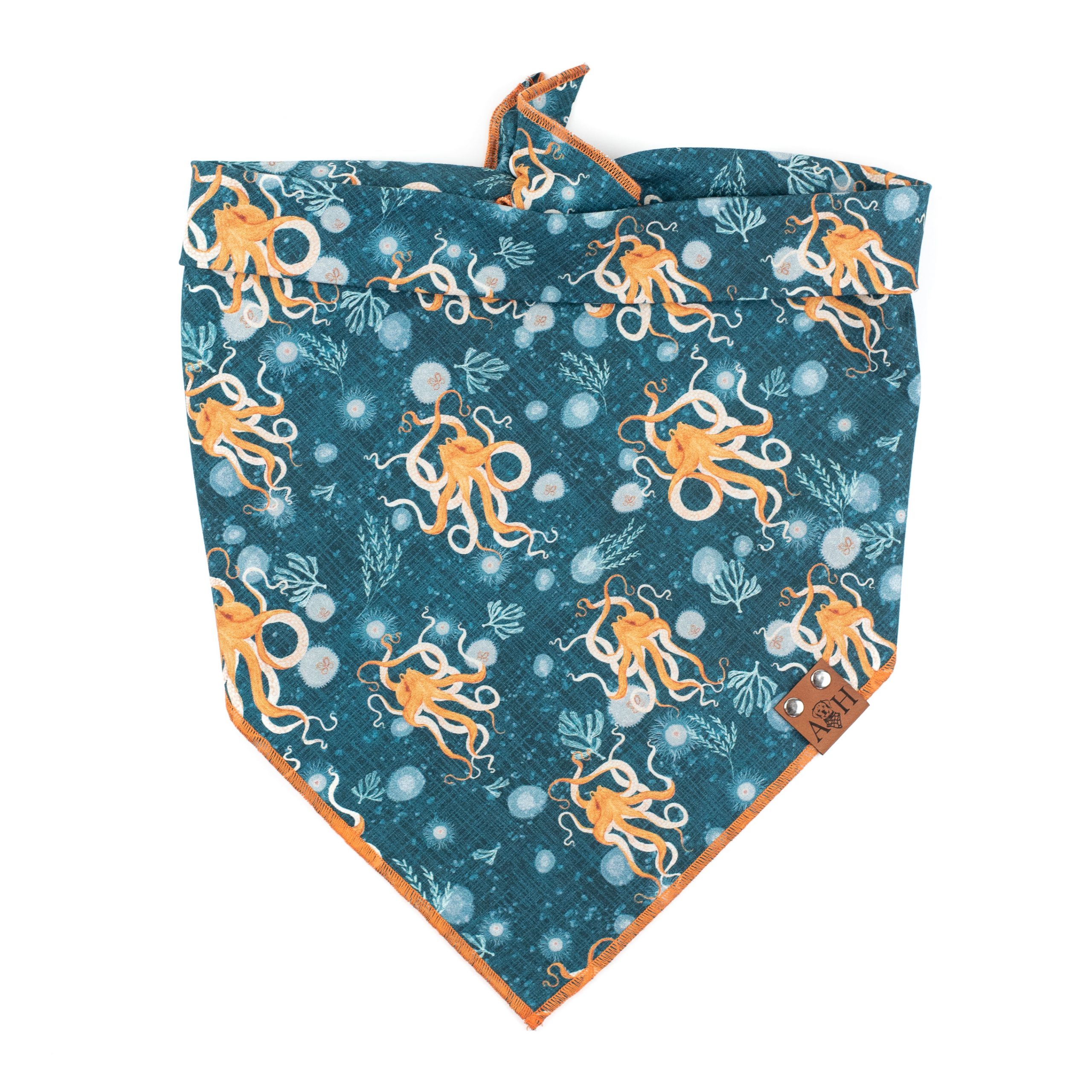 Octopus dog bandana with orange octopus on a blue ocean background